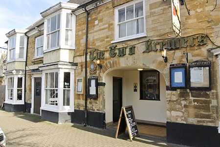 Two Brewers Public House and Restaurant is situated on the High Street
